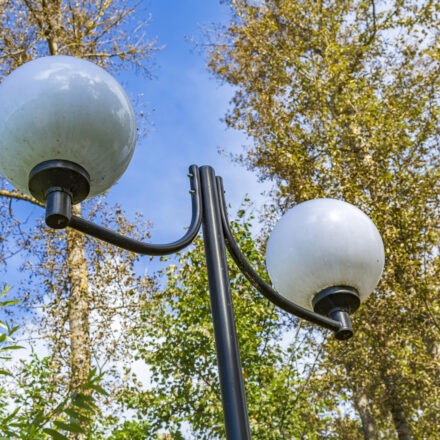 Vintage iron lantern in a public park in the daytime