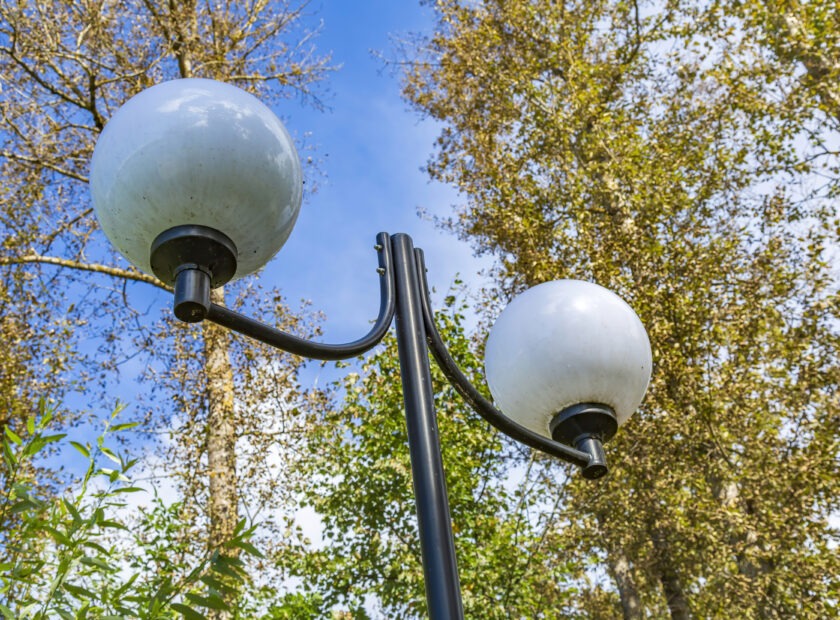 Vintage iron lantern in a public park in the daytime